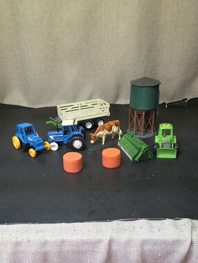 Assorted Farm Tractors, Wagon, Cow, Water Tower
